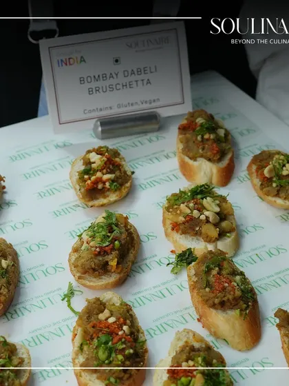 A creative fusion dish: Bombay Dabeli Bruschetta. This appetizer, served at the Google for India event, perfectly represents our innovative blend of Indian street food and global formats.