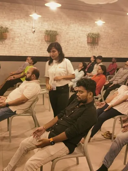 Finding moments of calm during a busy workday is essential for mental health and productivity. Here, I am guiding a corporate group through a chair yoga and meditation session, a simple practice designed to release tension and restore focus right at the office.