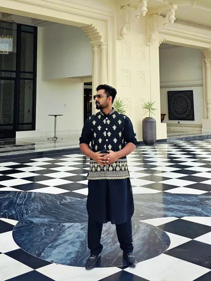 Dressed in traditional Indian attire. My identity as an artist is a blend of modern, international exposure and a deep connection to my Indian cultural roots.
