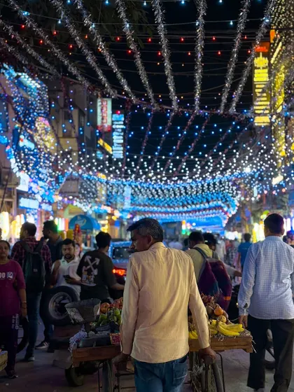 The markets of Delhi, like this one in Lajpat Nagar, come alive with decorations and crowds during Diwali. It's a vibrant and chaotic scene that I love to capture.
