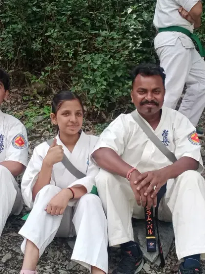 Taking a rest with some of my students during our trek. These informal moments are great for connecting with them on a personal level.