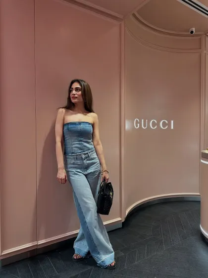 Another angle of the all-denim look. The fit of the corset and jeans creates a really flattering silhouette.