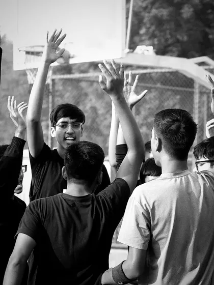 The energy of a team huddle is unmatched. This war cry before a game captures the unity and fighting spirit that we nurture in all our players.