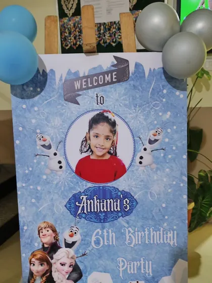 A personalized welcome sign for a Frozen-themed 6th birthday party, featuring characters from the movie.