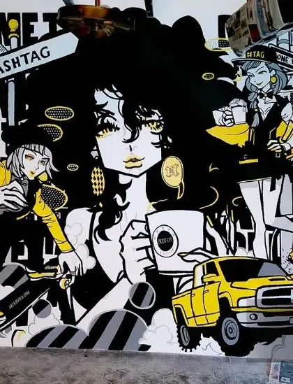 A complex, manga-inspired graffiti mural in a striking black, white, and yellow color scheme. This piece is packed with characters and details, creating an immersive and visually stunning artwork.