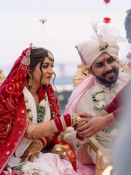 A candid moment from Divya's pinteresty wedding. Her makeup looks soft and beautiful during the ceremony, with a focus on her expressive eyes.