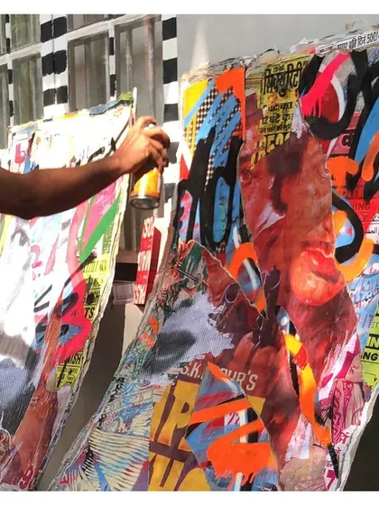 This is a more experimental, mixed-media piece. I combined layers of street posters with spray paint to create a textured, collage-like effect. It’s a different way to approach a large surface, blending graffiti with other urban elements.