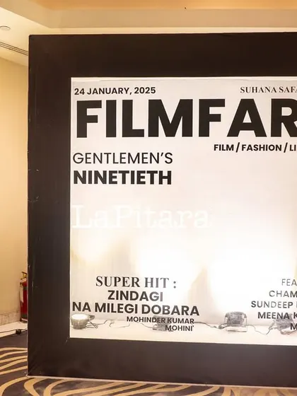 A giant, custom 'Filmfare' magazine cover photo booth, celebrating the 'Gentlemen's Ninetieth'.