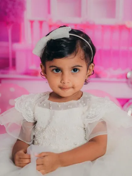 The perfect portrait of a little princess. Her calm and sweet demeanor was a joy to capture during her second birthday photoshoot.