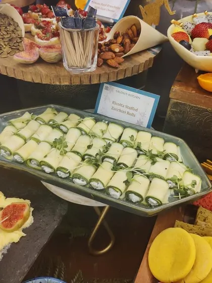 This image shows the delicate Ricotta Stuffed Zucchini Rolls, a healthy and elegant option on my grazing tables. They are perfect for guests looking for a lighter bite.