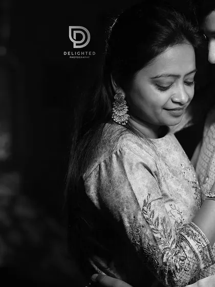 A timeless black and white portrait from a pre-wedding shoot. This intimate embrace is full of emotion, proving that sometimes the simplest shots are the most powerful.