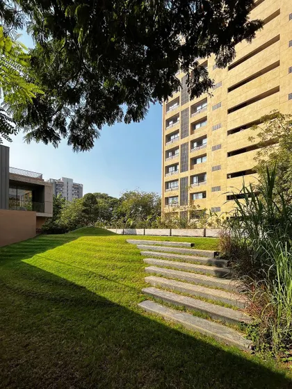 "The rising green" demonstrates how we blend landscape with architecture, with stone steps embedded in a sloping lawn that rises to meet the home.
