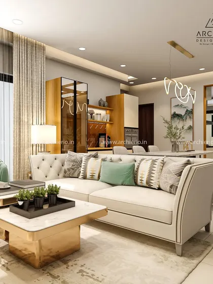 A classic and comfortable living room setup with a tufted sofa and a mix of patterned cushions. The space is designed to be both elegant and inviting for family and guests.