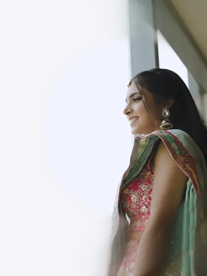 A beautiful, light-filled portrait of Vidushi. The soft makeup and natural light create a dreamy and ethereal effect.