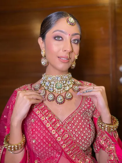A softer, more candid moment. The makeup looks just as stunning, proving its versatility and ability to capture the bride's personality.