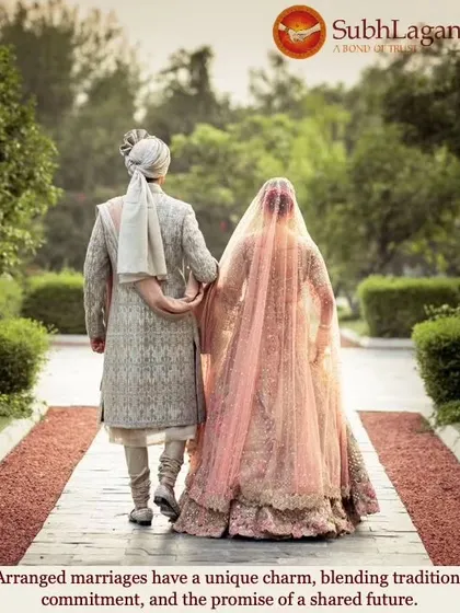 A bride and groom walk down a path in a lush garden, arm in arm. We believe in the unique charm of arranged marriages, blending tradition with the promise of a shared future.
