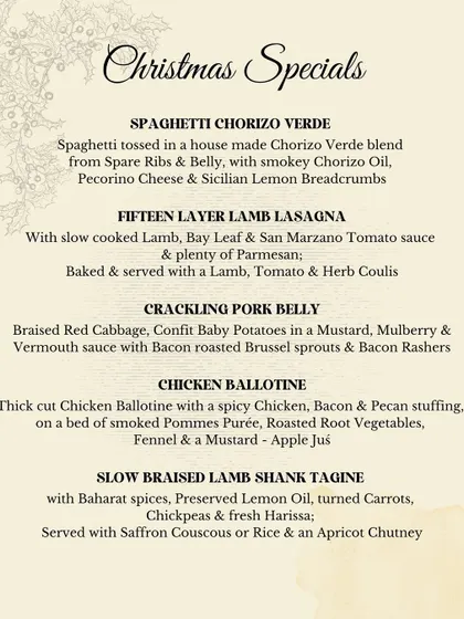 The main course section of our Christmas Specials menu, including a fifteen-layer lamb lasagna and crackling pork belly. These are hearty, celebratory dishes meant for sharing.