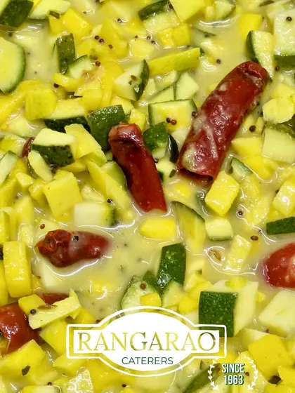 A refreshing white mango pickle, also known as Mavinakayi Gojju. Made with raw mango, cucumber, and mild spices, it's a perfect tangy accompaniment to any meal.
