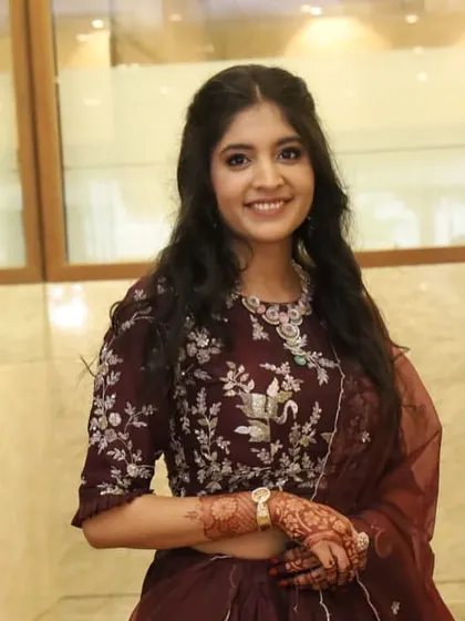 A beautiful smiling portrait of the engagement bride, looking radiant and confident.