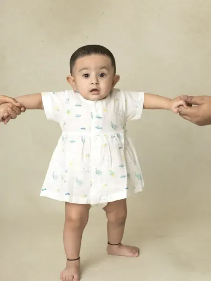 A collection of simple, classic portraits of twin babies. Without props or themes, their individual expressions and connection are beautifully highlighted.