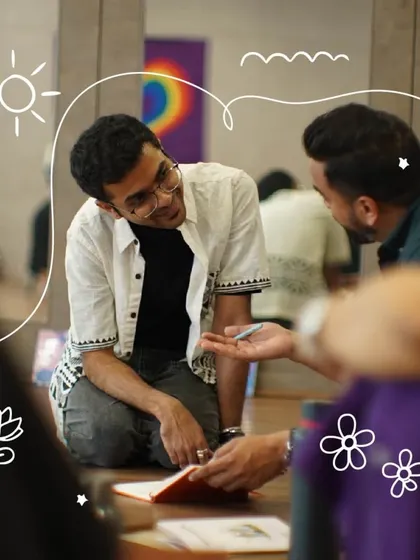 An instructor engages in a one on one conversation during our affirmations experience. We foster a supportive environment for personal discovery and growth.