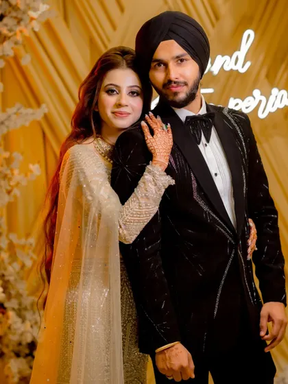 A classic portrait of the handsome couple, showcasing their stylish engagement attire.