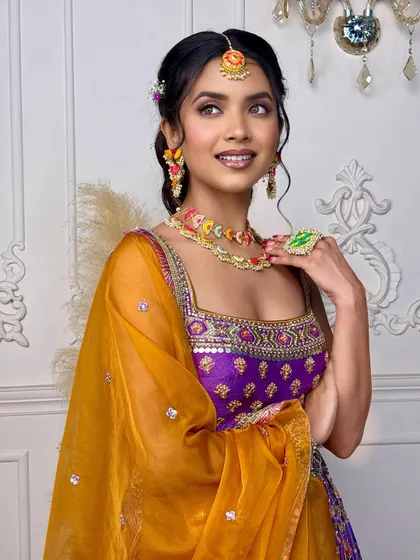 This portrait shows the complete 'Khushnuma' look, with the makeup, hair, and colourful outfit all working together in perfect harmony.