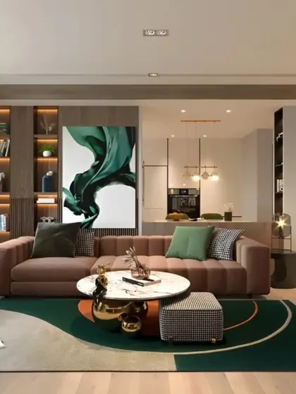 A spacious and luxurious living room layout we designed, featuring an open-concept flow into the kitchen area. The design uses a sophisticated color palette and high-end finishes to create an elegant environment for entertaining.