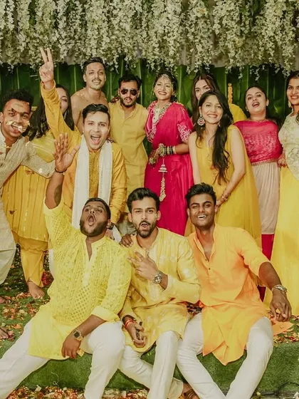 A fun group photo of the groom and his friends after the Haldi rituals.