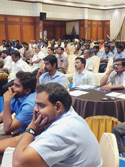 An engaged audience of panel builders, contractors, and engineers listening intently at the Salem seminar.