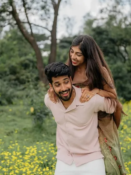 A happy piggyback ride through the fields. I encourage couples to have fun and be themselves, which always leads to the best photos.