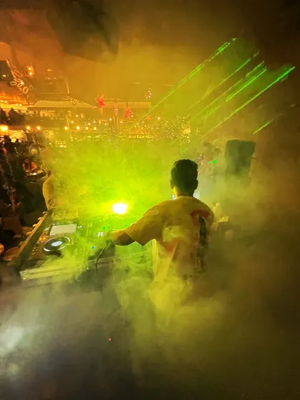 Surrounded by smoke and lasers, this is me in my element. The lighting and effects are a huge part of the total sensory experience at my shows.
