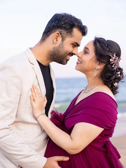 A close-up filled with love and tenderness. The soft light and gentle expressions make this a truly romantic maternity portrait.