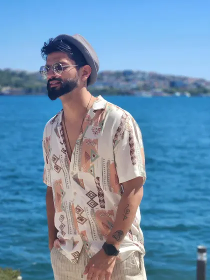 A relaxed, touristy look in Istanbul. It shows that I love to explore and soak in the culture of the places I travel to for work.