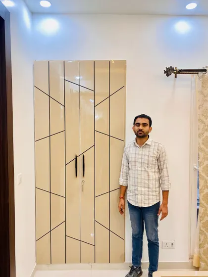 A simple and elegant two-door wardrobe with a geometric line pattern. This is a great design for smaller rooms.