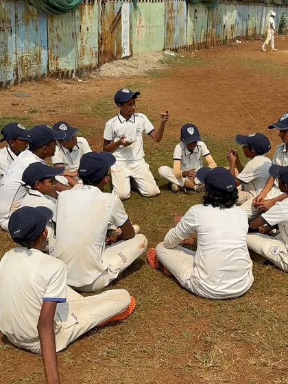 A team huddle after the U14 win at Azad Maidan. We encourage players to discuss strategy and support each other, fostering leadership skills from a young age.