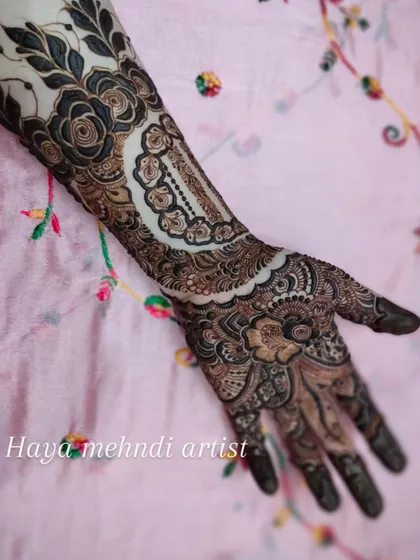 The final look of this intricate cuff and hand design, showing how different elements can be combined to create a stunning and cohesive piece.