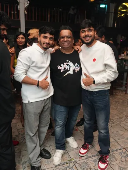 Posing with some fans who came out to support.