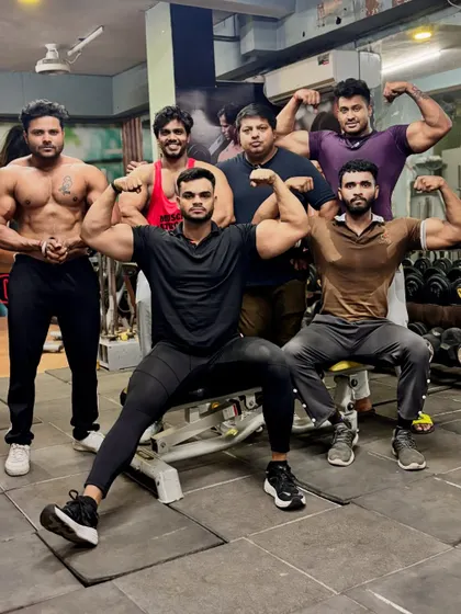 My team. Another group pose showing the camaraderie and shared passion for bodybuilding.