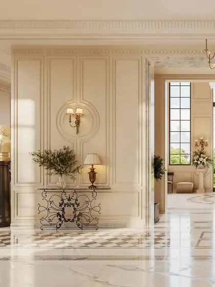 Every element is curated to tell a story of artistry. Here, a classical bust on a pedestal and an ornate console table stand against meticulously paneled walls, creating a vignette that speaks to a deep appreciation for historical design within a grand entrance.