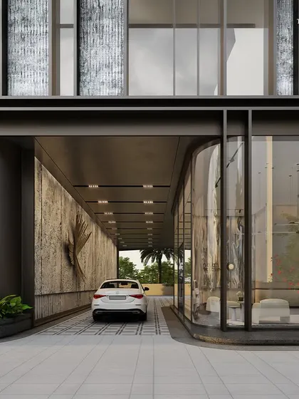 The covered driveway of the commercial tower, designed as a bold interplay of form, light, and proportion. This is not merely a transitional space but a ceremonial sense of arrival that leads into the sculptural lobby.