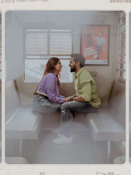A romantic, hazy shot of the couple sharing a moment in an empty train compartment.
