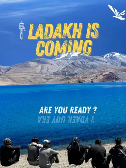 Ladakh is coming. Are you ready? This image of travelers sitting by the stunning Tso Moriri lake is a call to all adventurers to pack their bags for the journey of a lifetime.