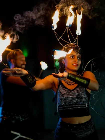 To make your Sangeet or reception truly unforgettable, I can arrange for spectacular entertainment. These fire dancers added a thrilling and dramatic flair to the evening's festivities.