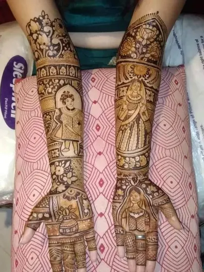 This design features multiple figures, including the bride, groom, and other characters, creating a full narrative across both arms.