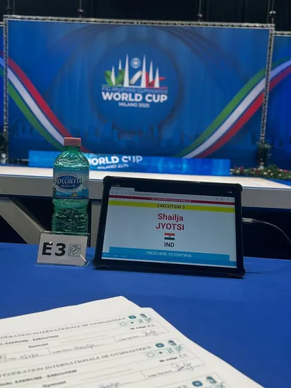 My view from the judge's table at the World Cup. Every detail matters, from execution to artistry, and I bring this meticulous focus to my students' training.
