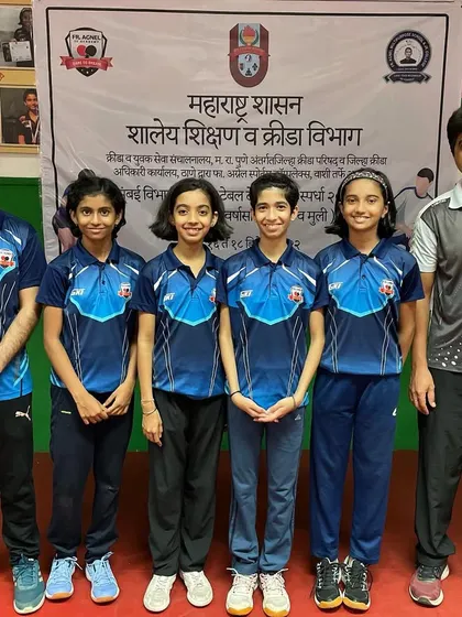 Our champion U-14 girls' team poses with their coaches after winning the gold medal at the Mumbai Divisional DSO Inter-School event.