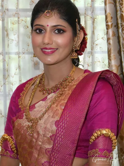 This bride is pretty in pink for her engagement day. I used shades of pink and rose gold for her makeup to match her beautiful saree and jewelry.