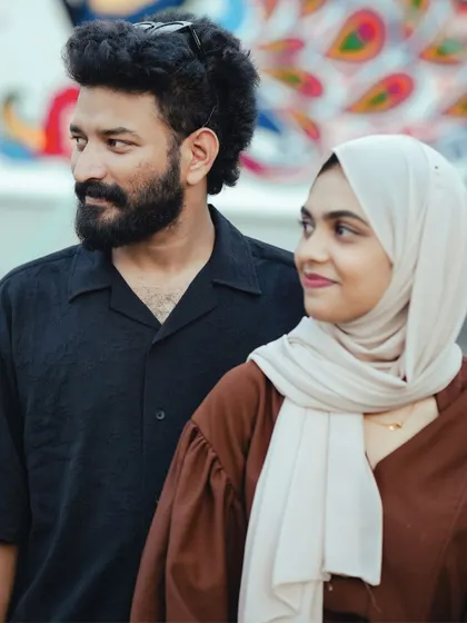 A close-up of the couple, with the woman looking lovingly at her partner. A simple, beautiful portrait that speaks volumes.