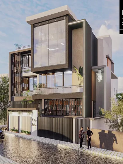 This modern residence features a sophisticated mix of concrete, wood, and glass. The floor-to-ceiling windows on the top floor create a stunning double-height space that is flooded with natural light.